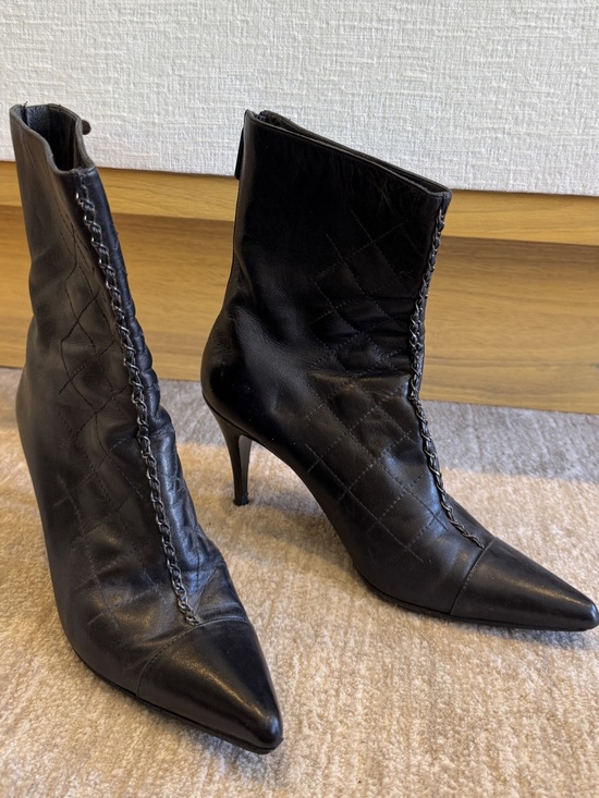 CHANEL Shoes - Chanel Black Quilted Leather Pointed-Toe Heeled Boots with Silver Chain Detail